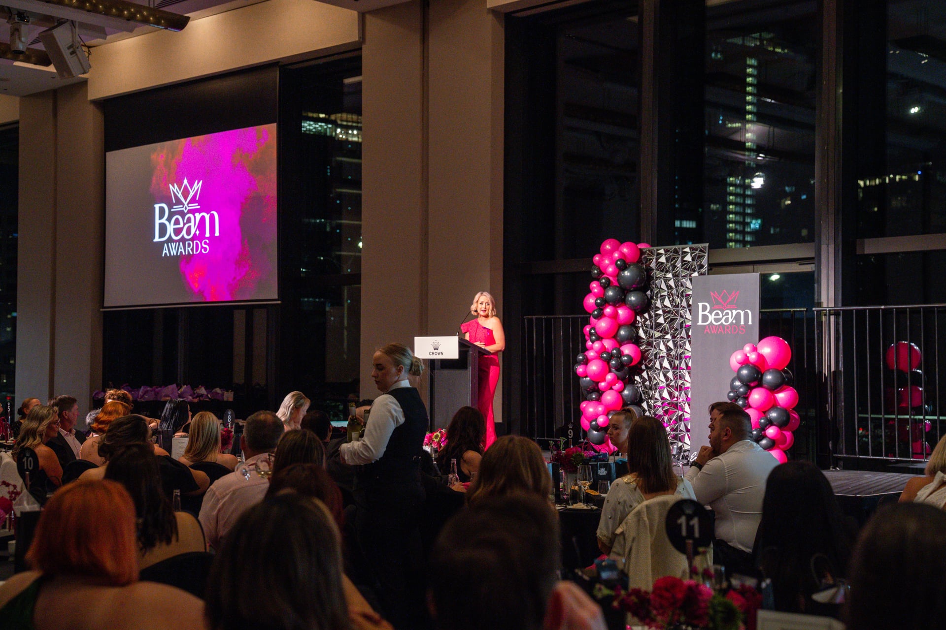 Guests seated at the Beam Awards gala as the host speaks from the stage